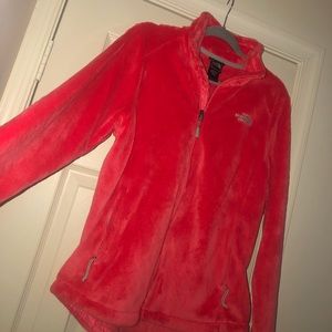 Women’s pink/coral fuzzy north face jacket